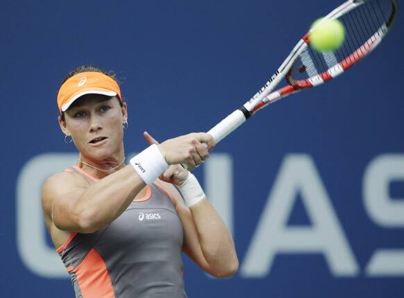 Samantha Stosur, of Australia, returns a shot to Victoria Azarenka, of Belarus, in the quarterfinals of the 2012 US Open tennis tournament in New York. 