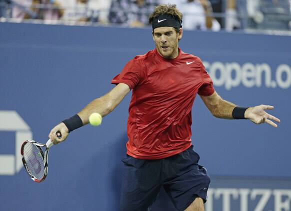 Argentina's Juan Martin Del Potro returns a shot to Andy Roddick in the fourth round of play during the 2012 US Open tennis tournament in New York.