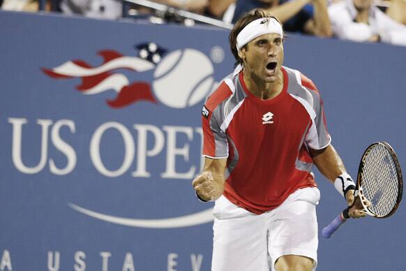 Spain's David Ferrer reacts during his match against Richard Gasquet, of France, in the fourth round of the 2012 US Open tennis tournament in New York. 