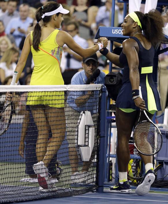 Serena Williams, right, is congratulated by Ana Ivanovic, of Serbia, after Williams defeated Ivanovic 6-1, 6-3 in a quarterfinals match at the U.S. Open tennis tournament.