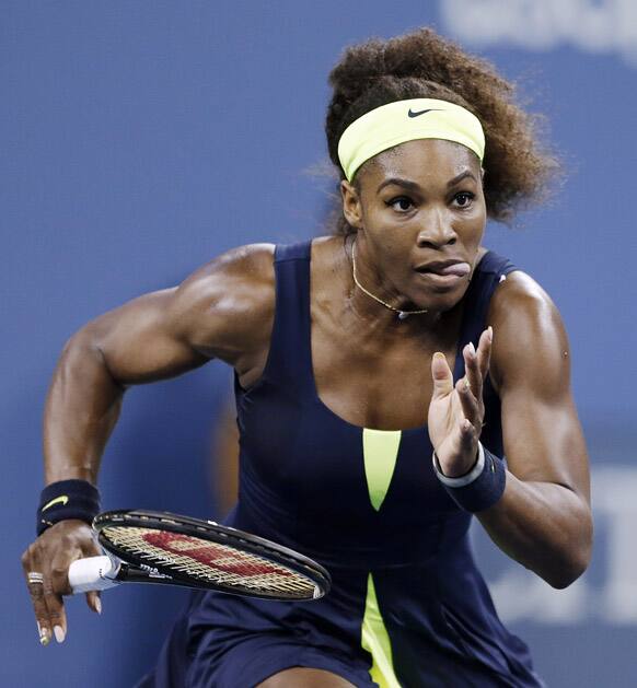 Serena Williams chases down a shot from Ana Ivanovic, of Serbia, during a quarterfinal at the U.S. Open tennis tournament.