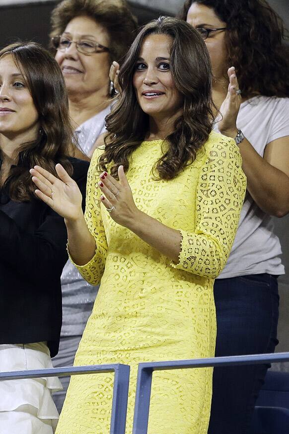 Pippa Middleton watches the quarterfinals match between Roger Federer, of Switzerland, and Tomas Berdych, of Czech Republic, at the U.S. Open tennis tournament.