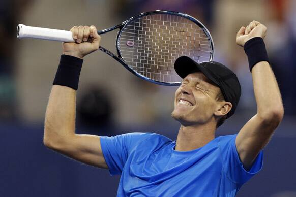 Tomas Berdych, of the Czech Republic, reacts after beating Roger Federer, of Switzerland, in the quarterfinal round of play at the U.S. Open tennis tournament in New York. Berdych won 7-6 (1), 6-4, 3-6, 6-3.