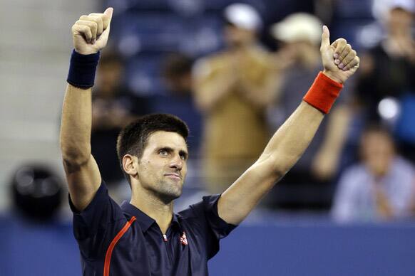 Novak Djokovic, of Serbia, reacts after defeating Juan Martin del Potro, of Argentina, in a quarterfinals match at the U.S. Open tennis tournament.