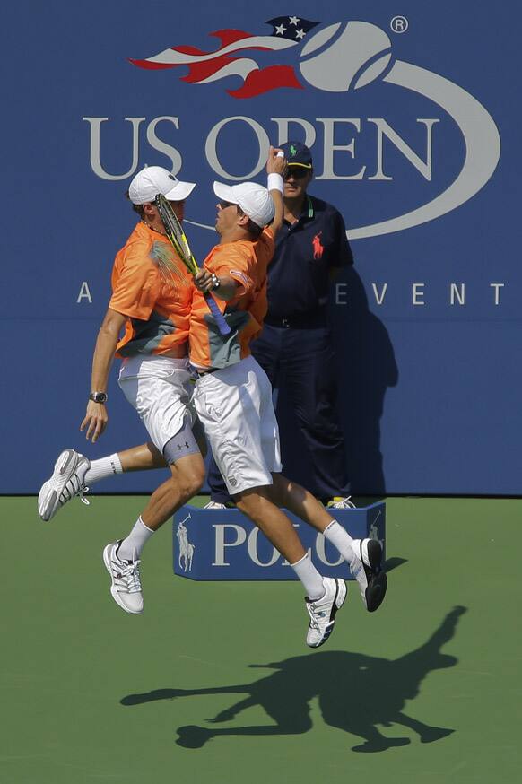 Bob, and Mike Bryan celebrate during their match against Leander Paes and Czech Republic's Radek Stepanek during the men's doubles final of the 2012 US Open tennis tournament.