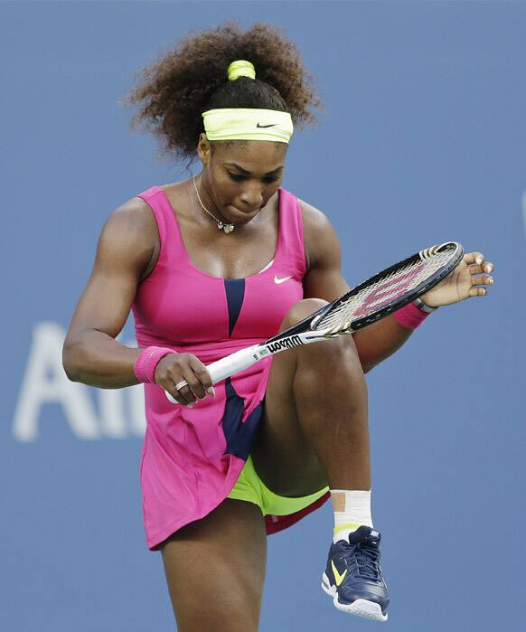 Serena Williams reacts during her match against Italy's Sara Errani during a semifinal match at the 2012 US Open tennis tournament.