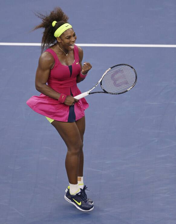 Serena Williams reacts while playing Italy's Sara Errani during a semifinal match at the 2012 US Open tennis tournament.