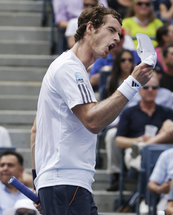 Britain's Andy Murray reacts after losing his hat for a second time while the ball was in play against Tomas Berdych, of the Czech Republic, during a semifinal match at the 2012 US Open tennis tournament.