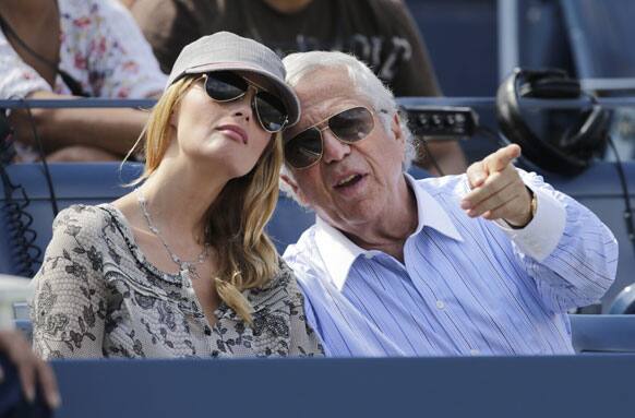 Actress Ricki Noel Lander, left, and Robert Kraft, chairman and CEO of the Kraft Group, watch a semifinal match between Britain's Andy Murray and Tomas Berdych, of the Czech Republic, during a semifinal match at the 2012 US Open tennis tournament.