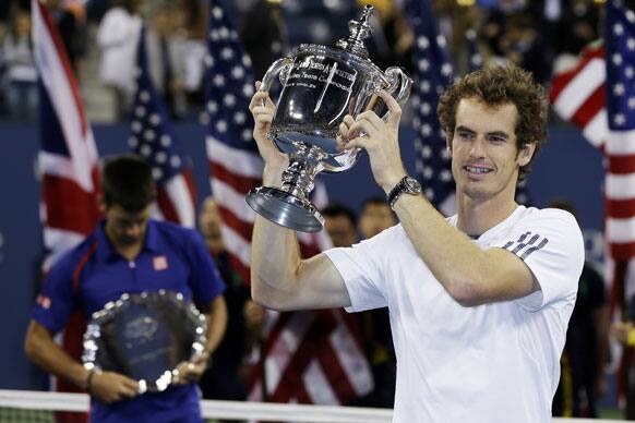 Britain's Andy Murray poses with the trophy after defeating Serbia's Novak Djokovic in the championship match at the US Open tennis tournament.