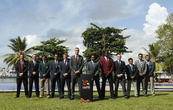 Captains of the teams participating in the ICC 2012 World Twenty20 pose for a group photograph with the trophy in Colombo.