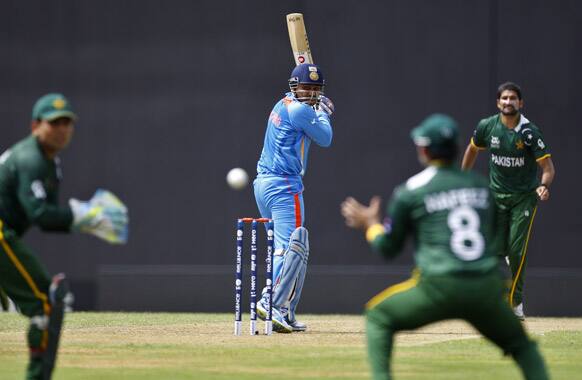 Virender Sehwag, center, plays a shot during a warm-up match against Pakistan ahead of the ICC Twenty20 Cricket World Cup in Colombo.