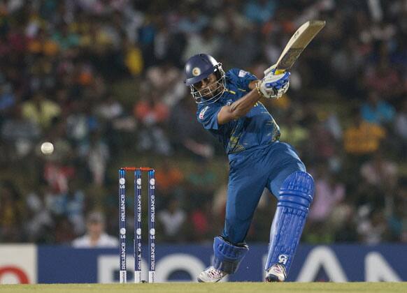 Sri Lanka's Tillakaratne Dilshan plays a shot during the ICC Twenty20 Cricket World Cup match between Sri Lanka and Zimbabwe in Hambantota, Sri Lanka.