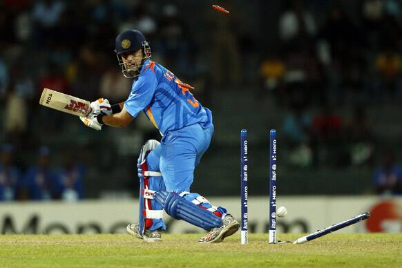 Gautam Gambhir is bowled out by Afghanistan's bowler Shapoor Zadran, not in photo, during their ICC Twenty20 Cricket World Cup match in Colombo, Sri Lanka.