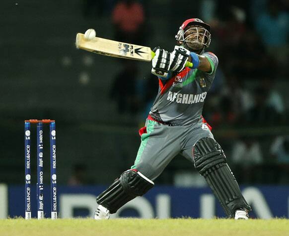 Afghanistan's Mohammad Shahzad plays a shot during their ICC Twenty20 Cricket World Cup match against India in Colombo.