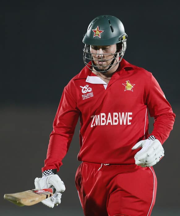 Zimbabwe's captain Brendan Taylor walks back to the pavilion after his dismissal during the ICC Twenty20 Cricket World Cup match between South Africa and Zimbabwe in Hambantota, Sri Lanka.