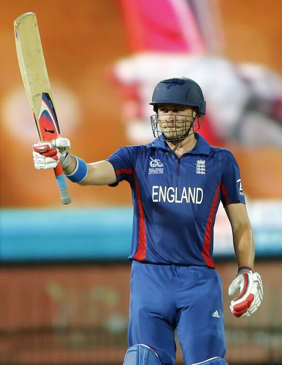 England batsman Luke Wright celebrates scoring a half century during their match against Afghanistan in the ICC Twenty20 Cricket World Cup in Colombo.