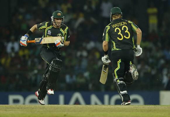 Australia's batsmen Shane Watson, right, and Michael Hussey run between wickets during their ICC Twenty20 Cricket World Cup match agianst West Indies' in Colombo.