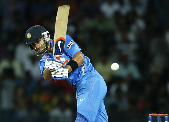 Virat Kohli plays a shot during an ICC Twenty20 Cricket World Cup match against England in Colombo, Sri Lanka.