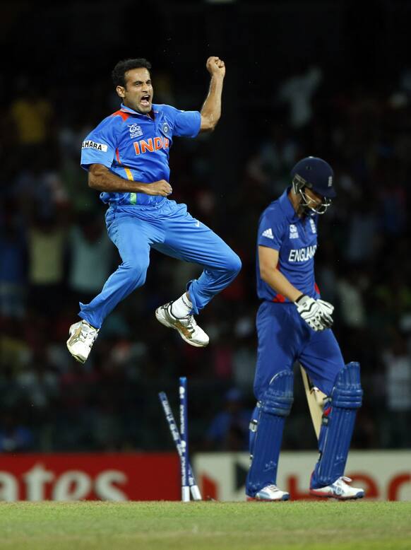 India's bowler Irfan Pathan, left, celebrates the wicket of England's batsman Alex Hales during an ICC Twenty20 Cricket World Cup match in Colombo.