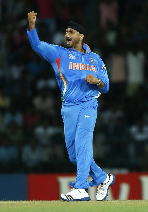 Indian bowler Harbhajan Singh celebrates the wicket of England's batsman Jonny Bairstow during an ICC Twenty20 Cricket World Cup match in Colombo.