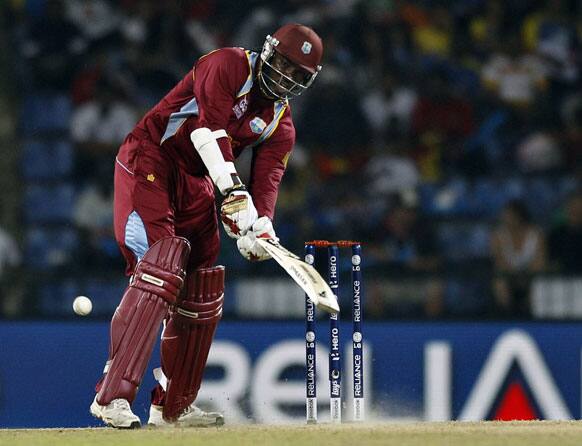 West Indies' batsman Chris Gayle plays a shot during the ICC Twenty20 Cricket World Cup Super Eight match against England in Pallekele, Sri Lanka.