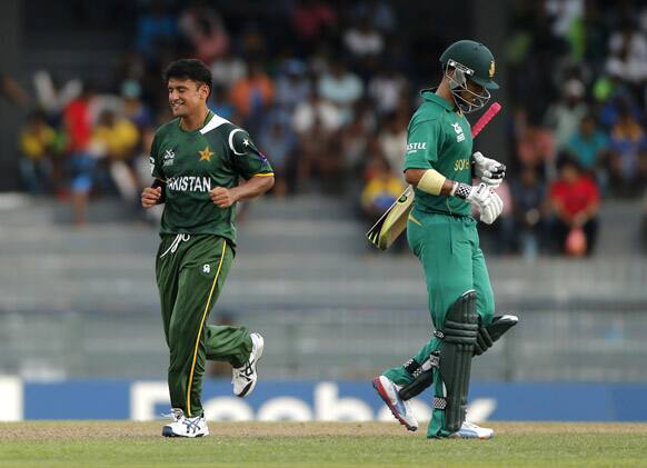 Yasir Arafat celebrates taking the wicket of Jean-Paul Duminy during their ICC Twenty20 Cricket World Cup Super Eight match in Colombo.