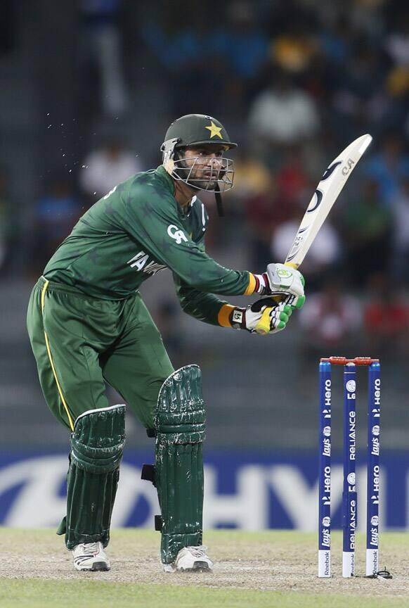 Pakistan's batsmean Shoaib Malik looks for runs during an ICC Twenty20 Cricket World Cup Super Eight match between Pakistan and South Africa, in Colombo.