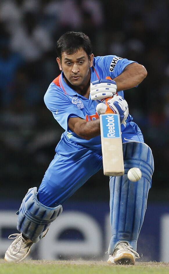 India's captain Mahendra Singh Dhoni bats during a ICC Twenty20 Cricket World Cup Super Eight match between India and Australia in Colombo.