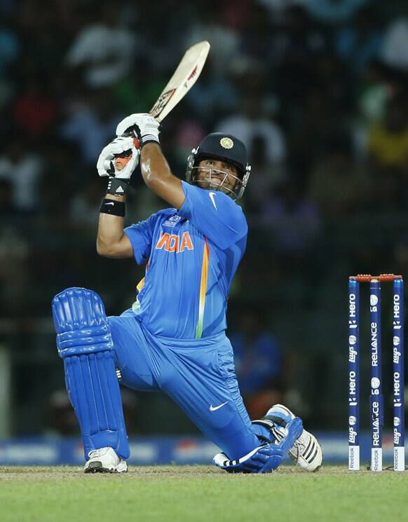 India's batsman Suresh Raina plays a shot during the ICC Twenty20 Cricket World Cup Super Eight match against Australia in Colombo.