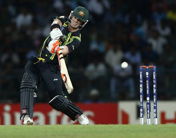 Australia's batsman David Warner plays a shot against India during the ICC Twenty20 Cricket World Cup Super Eight match in Colombo.