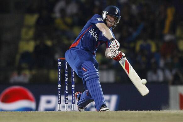 England's batsman Eoin Morgan plays a shot during an ICC Twenty20 Cricket World Cup Super Eight match against New Zealand, in Pallekele.