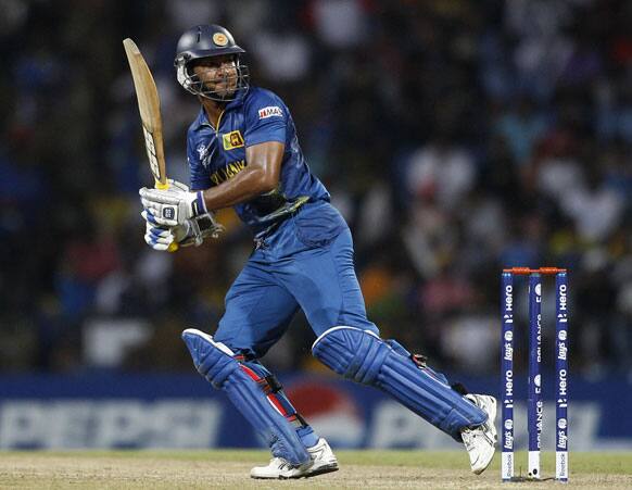 Sri Lanka's batsman Kumar Sangakkara watches his shot during the ICC Twenty20 Cricket World Cup Super Eight match against West Indies' in Pallekele.