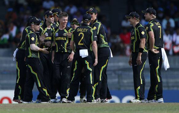 Australian team members congratulate bowler Xavier Doherty, third left, for taking the wicket of South African batsman Jacques Kallis, unseen, during the ICC Twenty20 Cricket World Cup Super Eight match between Australia and South Africa in Colombo.