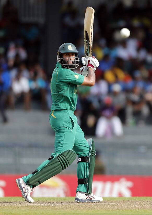 Hashim Amla watches after playing a shot during the ICC Twenty20 Cricket World Cup Super Eight match between Australia and South Africa in Colombo.