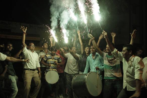 Indian cricket fans light crackers as they celebrate Indian team's victory against Pakistan in Sunday's ICC Twenty20 Cricket World Cup match against Pakistan in Ahmadabad.