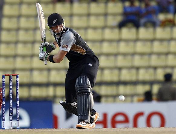 New Zealand's batsman Martin Guptill plays a shot during an ICC Twenty20 Cricket World Cup Super Eight match against West Indies, in Pallekele.