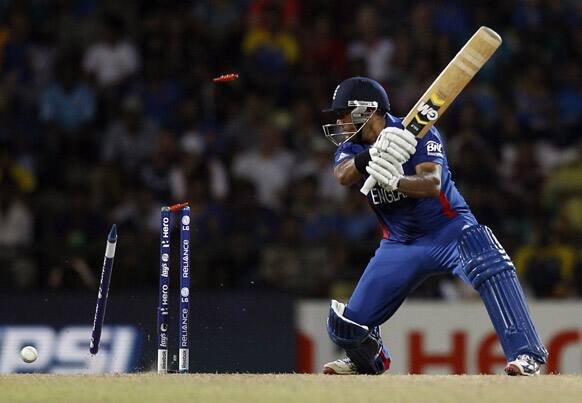 England's batsman Samit Patel is bowled out by Sri Lanka's bowler Lasith Malinga, not seen, during the ICC Twenty20 Cricket World Cup Super Eight match in Pallekele, Sri Lanka.