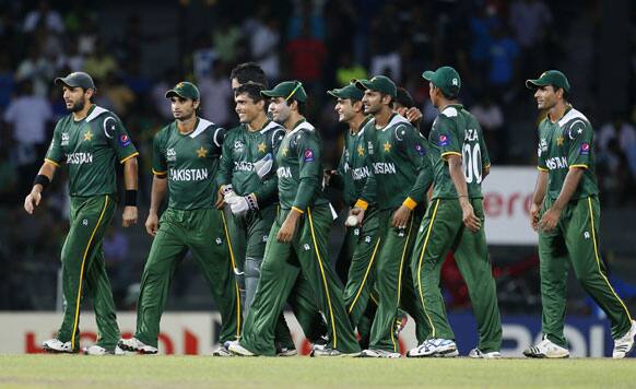 Pakistan's cricketers celebrate their victory over Australia after the ICC Twenty20 Cricket World Cup Super Eight match in Colombo.