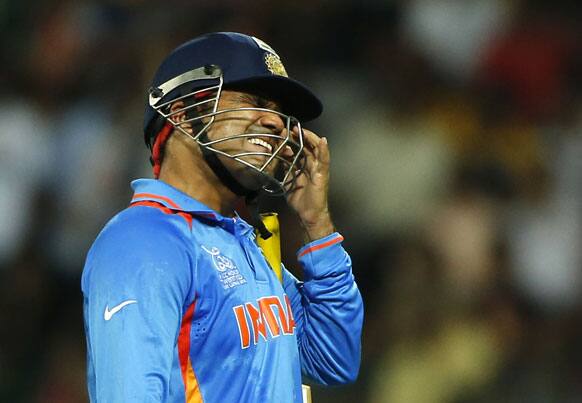 India's Virender Sehwag reacts after being dismissed during the ICC Twenty20 Cricket World Cup Super Eight match between India and South Africa in Colombo.