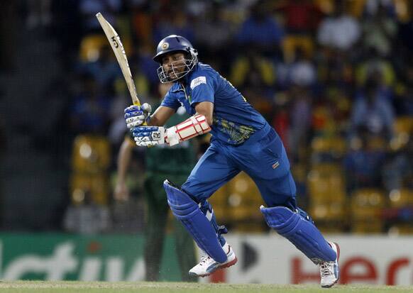 Sri Lanka's batsman Tillakaratne Dilshan watches his shot against Pakistan during their ICC Twenty20 Cricket World Cup semifinal match in Colombo.