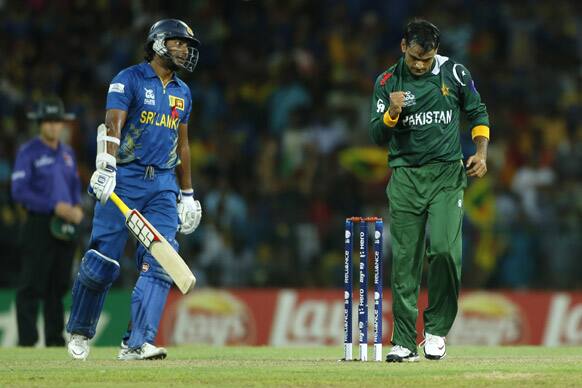 Mohammad Hafeez celebrates the dismissal of Sri Lankan batsman Kumar Sangakkara during the ICC Twenty20 Cricket World Cup semi final match between Pakistan and Sri Lanka in Colombo.