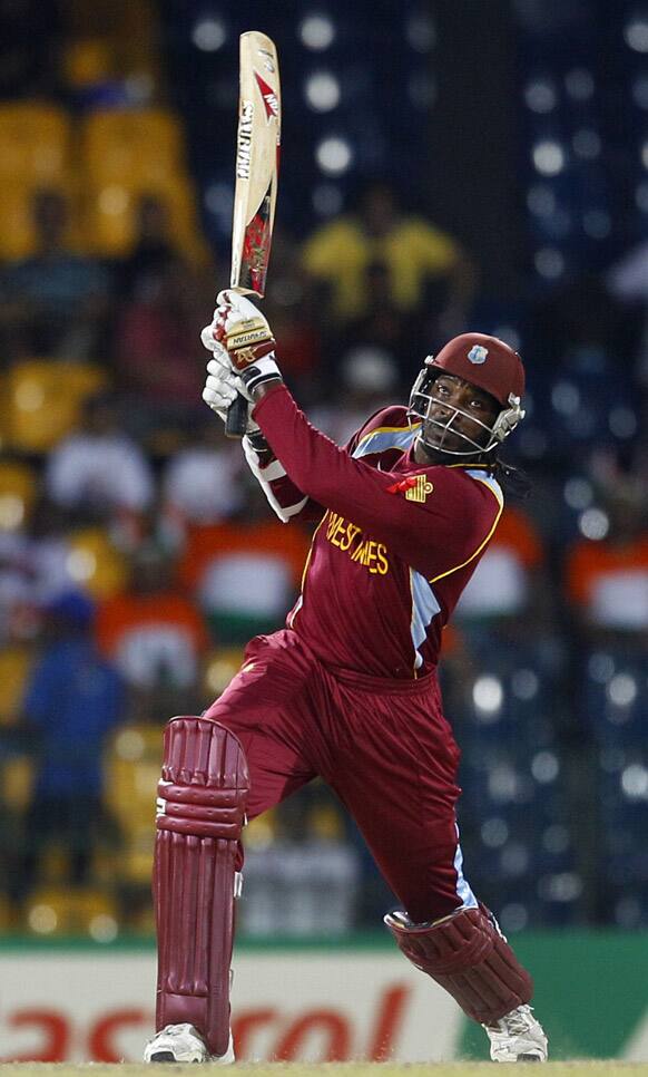 West Indies' batsman Chris Gayle plays a shot during the ICC Twenty20 Cricket World Cup semifinal match against Australia in Colombo.