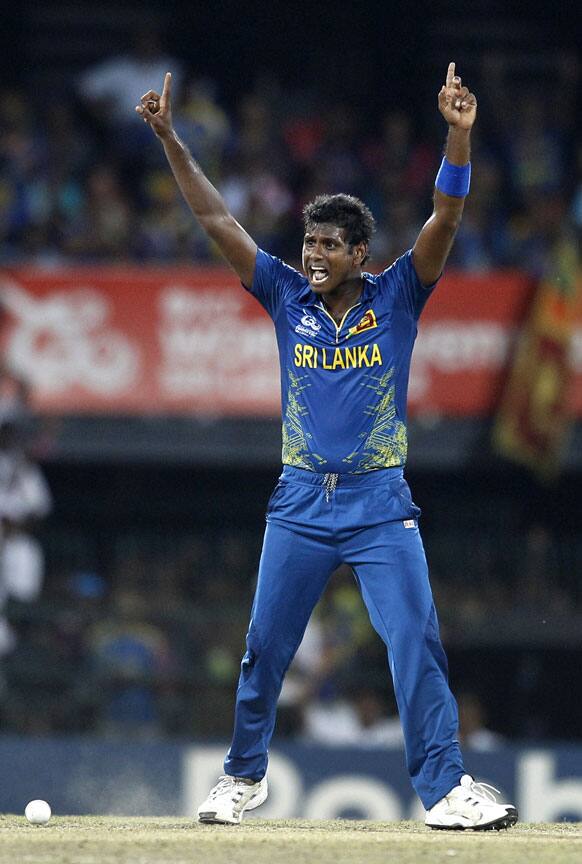 Sri Lanka's bowler Angelo Mathews appeals unsuccessfully for the wicket of West Indies' batsman Marlon Samuels, not seen, during their ICC Twenty20 Cricket World Cup final match in Colombo.