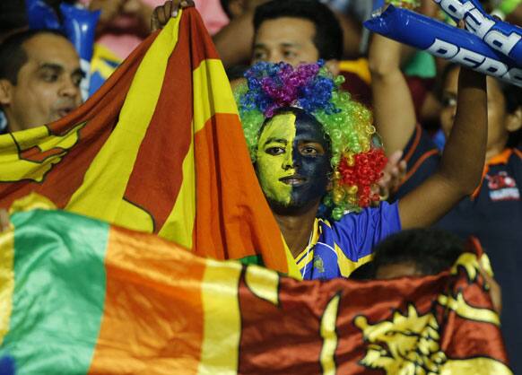 Sri Lankan fan cheers during their ICC Twenty20 Cricket World Cup final match between Sri Lanka and West Indies' in Colombo.