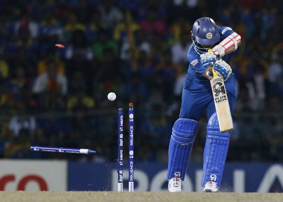 Sri Lanka's batsman Tillakaratne Dilshan loses his wicket during the ICC Twenty20 Cricket World Cup final match between Sri Lanka and West Indies in Colombo.