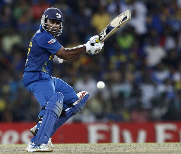 Sri Lanka's captain Mahela Jayawardene plays a shot during the ICC Twenty20 Cricket World Cup final match against West Indies' in Colombo.