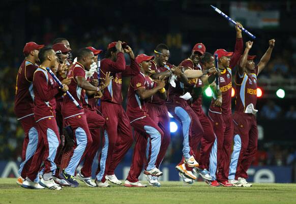 West Indies' team members celebrate winning the ICC Twenty20 Cricket World Cup final match defeating Sri Lanka in Colombo.