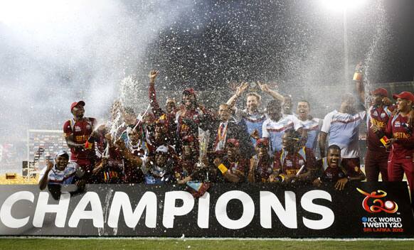 West Indies' players celebrate with the trophy their win over Sri Lanka in the ICC Twenty20 Cricket World Cup final match in Colombo.