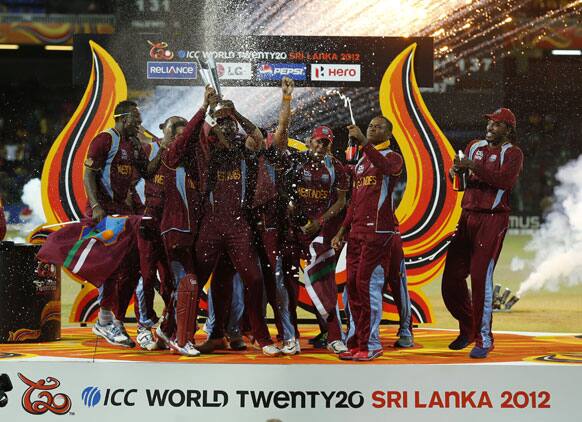 Members of the West Indies' team celebrate their win over Sri Lanka in the ICC Twenty20 Cricket World Cup final match in Colombo.